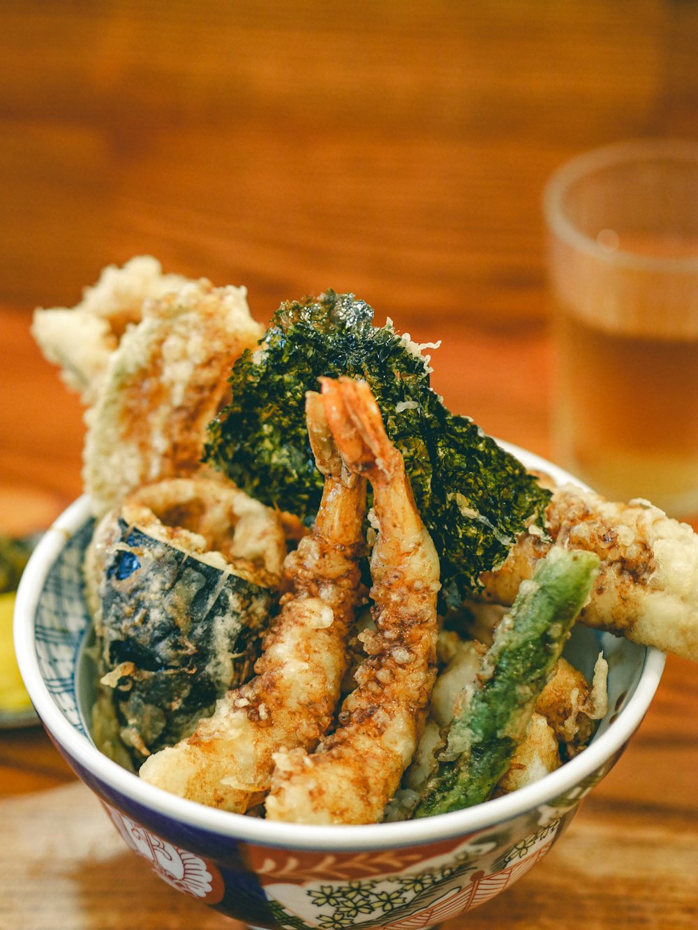 Shrimp and vegetable tempura over rice